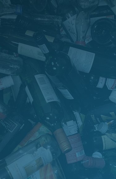 glass bottle waste in pile